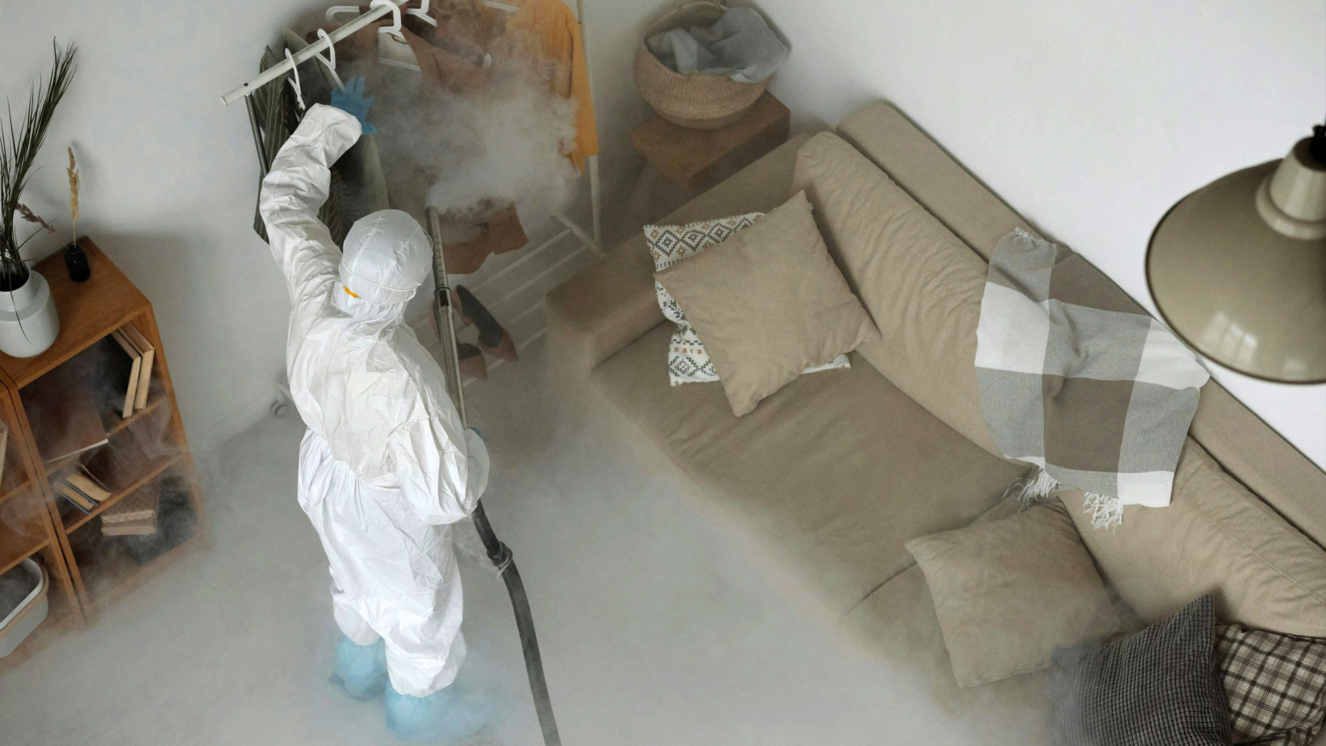 Overhead of living room being fumigated